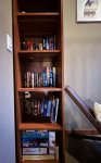 Books, puzzles, and games are located up in the lofts bookshelf